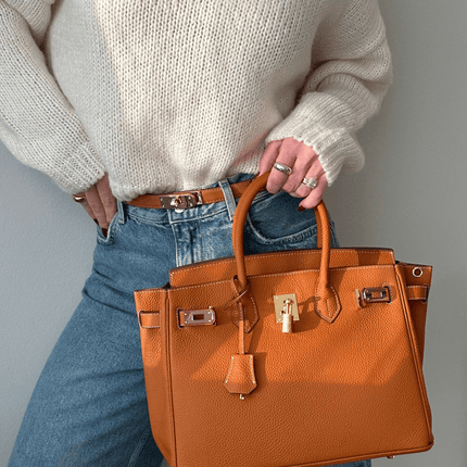 Iconic Vegan Leather Handbag – Timeless Design with Gold Accents