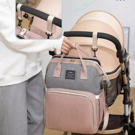 Multifunctional Diaper Backpack with Foldable Baby Bed & USB Charging Port – Waterproof & Spacious Travel Bag for Parents