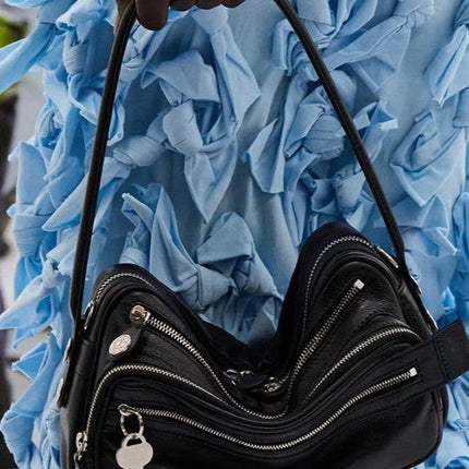 Black Vegan Leather Crescent Crossbody Bag – Adjustable Strap, Multiple Zipper Pockets, Sleek Silver Accents