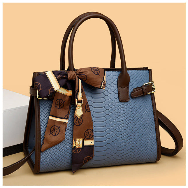 Chic Beige Handbag with Scarf Detail – Luxury Snake Texture