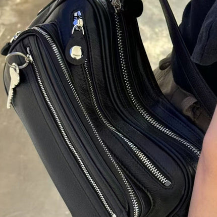 Black Vegan Leather Crescent Crossbody Bag – Adjustable Strap, Multiple Zipper Pockets, Sleek Silver Accents