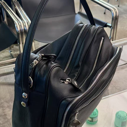 Black Vegan Leather Crescent Crossbody Bag – Adjustable Strap, Multiple Zipper Pockets, Sleek Silver Accents