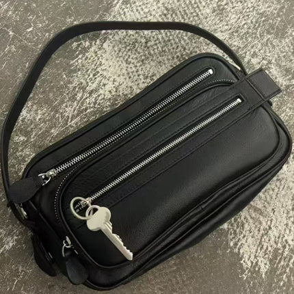 Black Vegan Leather Crescent Crossbody Bag – Adjustable Strap, Multiple Zipper Pockets, Sleek Silver Accents