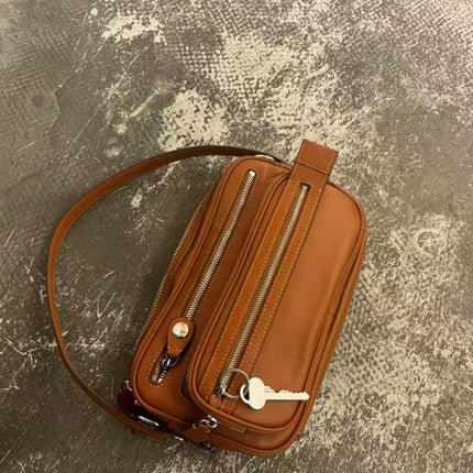 Black Vegan Leather Crescent Crossbody Bag – Adjustable Strap, Multiple Zipper Pockets, Sleek Silver Accents