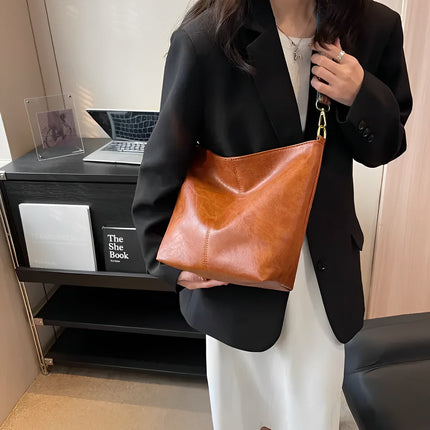 Stylish Brown Handbag with Wide Shoulder Strap – Spacious & Elegant