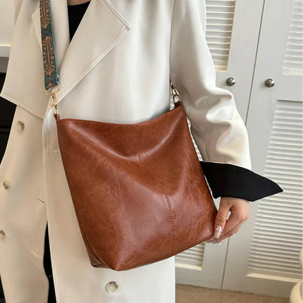 Stylish Brown Handbag with Wide Shoulder Strap – Spacious & Elegant